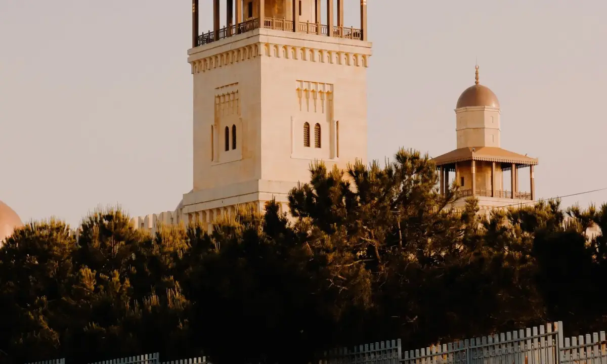 Traffic on an Amman street near a mosque