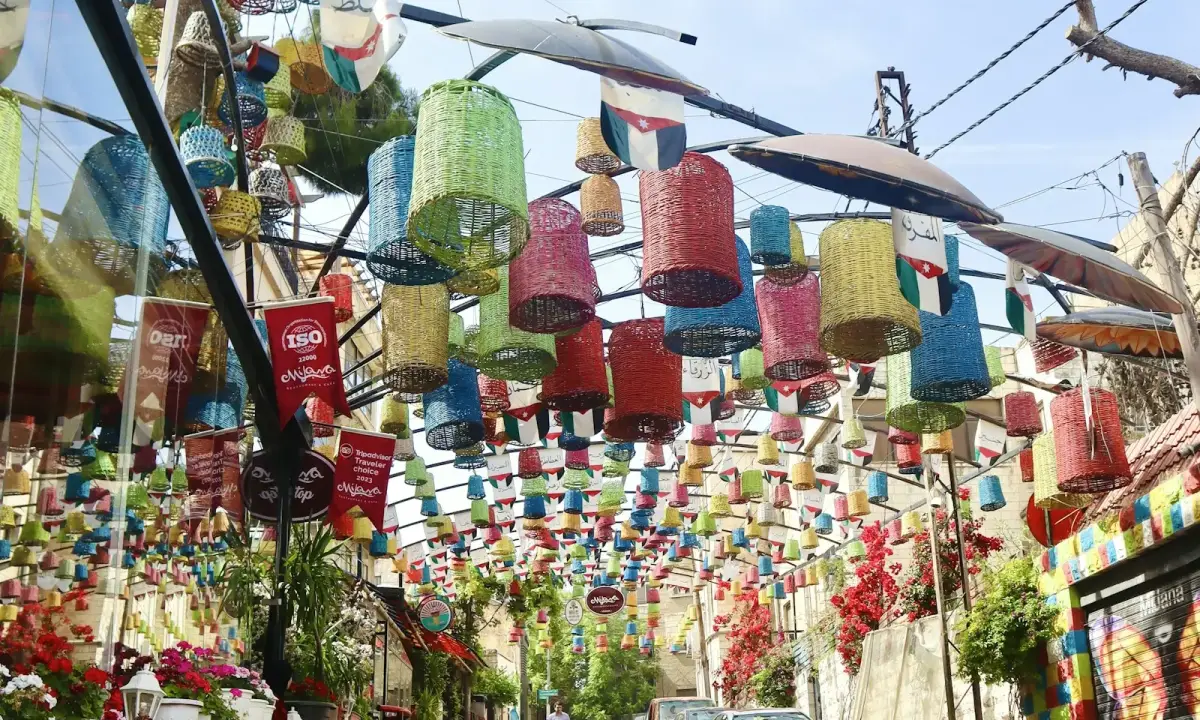 Colourful lanterns hanging over Rainbow Street in Amman