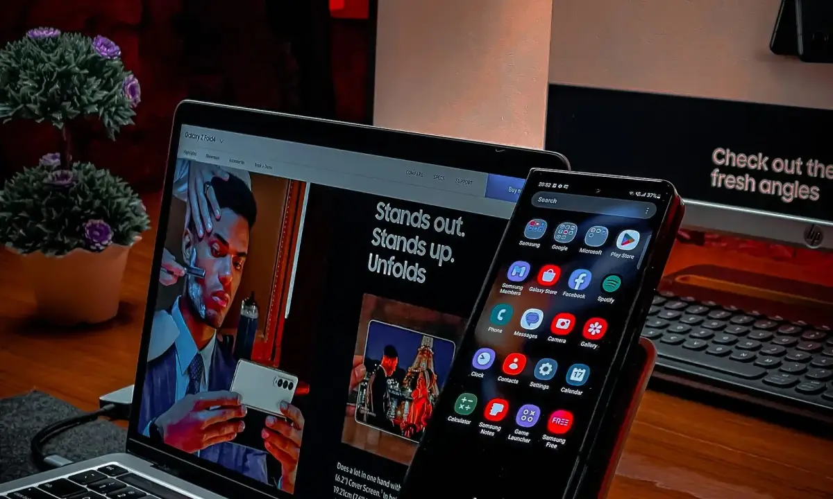 A laptop and smartphone on a desk