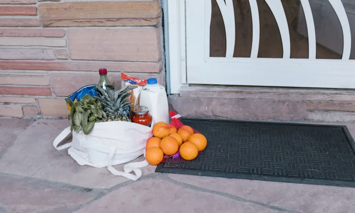A reusable bag filled with groceries