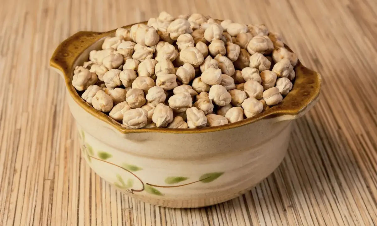 Chickpeas in a bowl. Ingredient illustration; preparation and cross-contact still matter.
