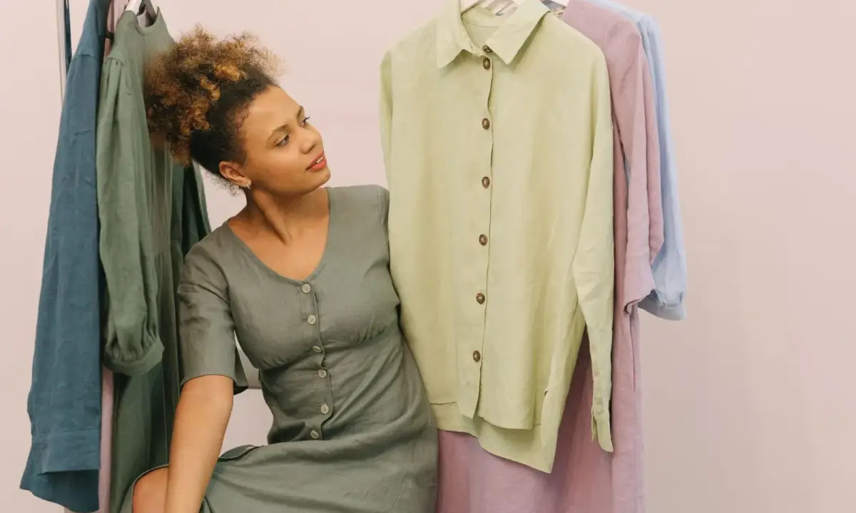 Choosing light clothing on a clothes rail
