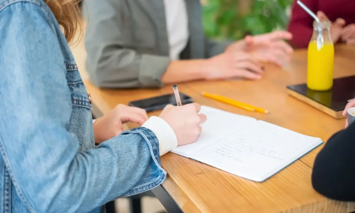 Taking notes during a meeting
