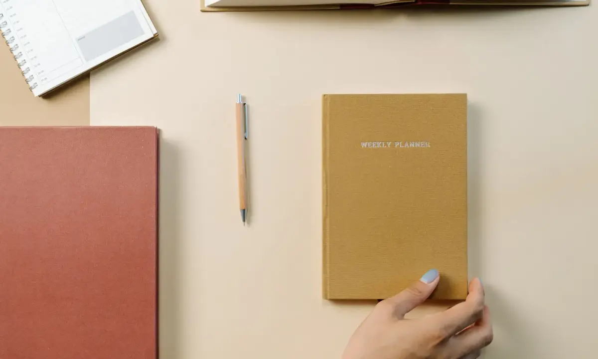 A weekly planner and notebook